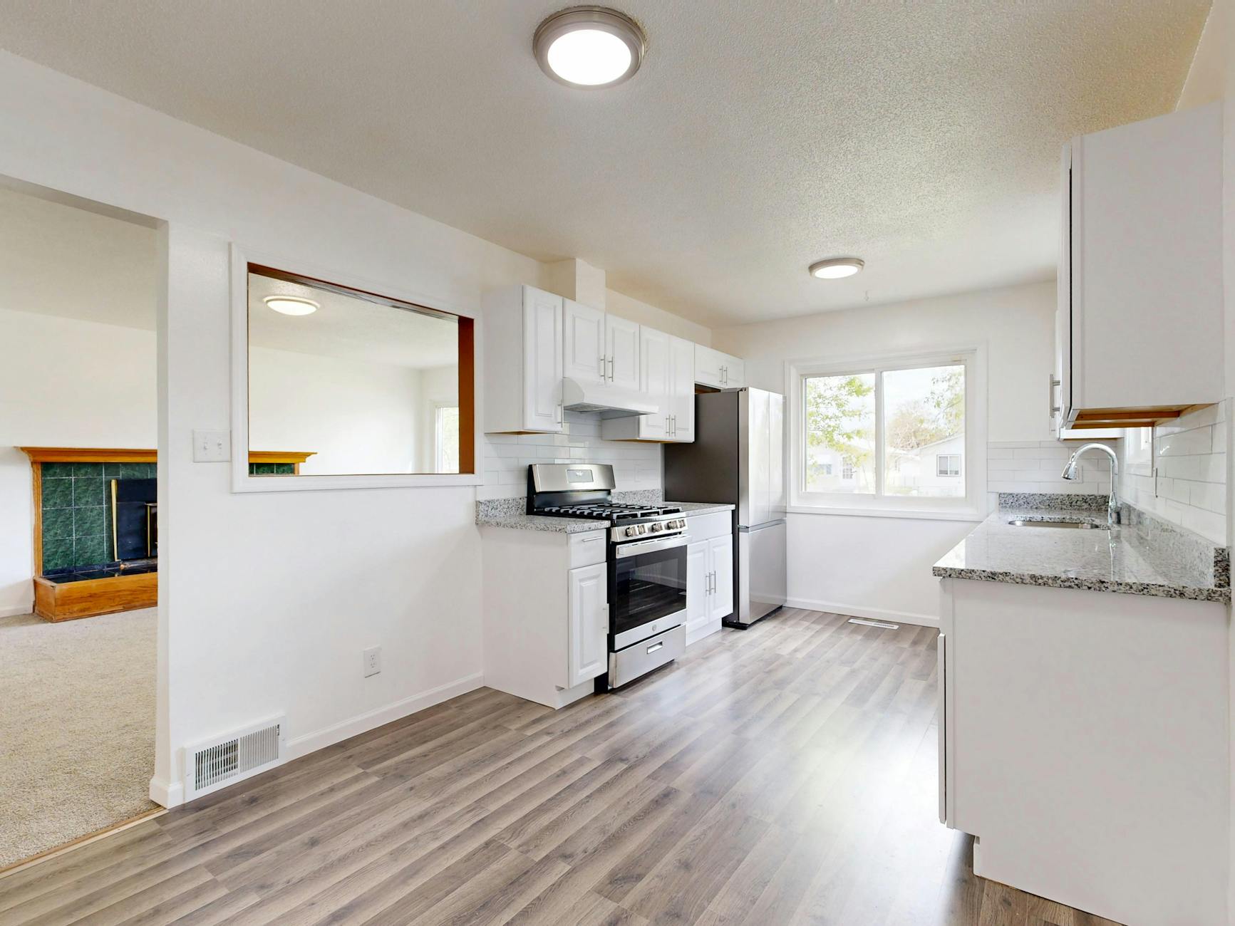 Newly renovated kitchen by White River Group